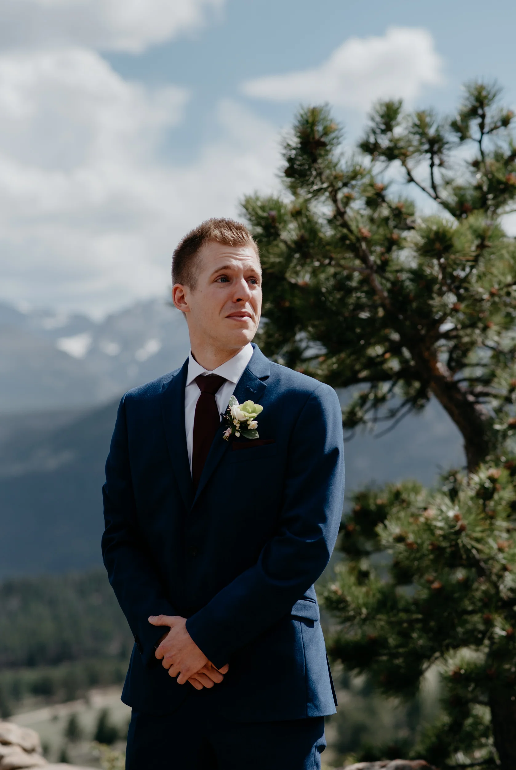  3M Curve, Rocky Mountain National Park elopement. Colorado wedding photographer. Grooms reaction seeing bride. 