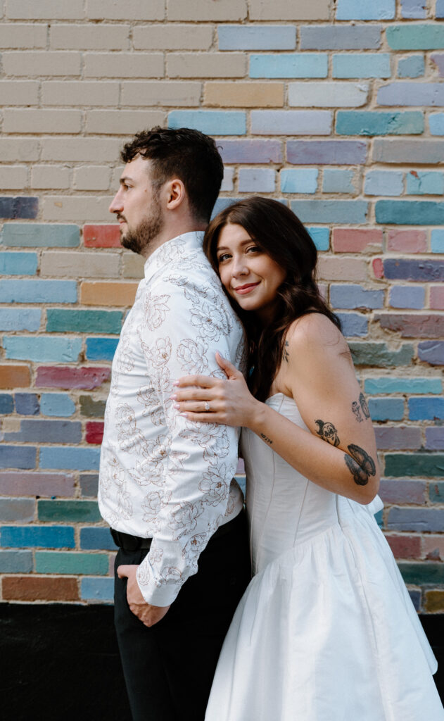 Fiancée looking at the camera and smiling during engagement session on Pearl Street