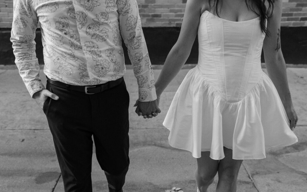 Close-up of couple's outfits from an engagement session on Pearl Street