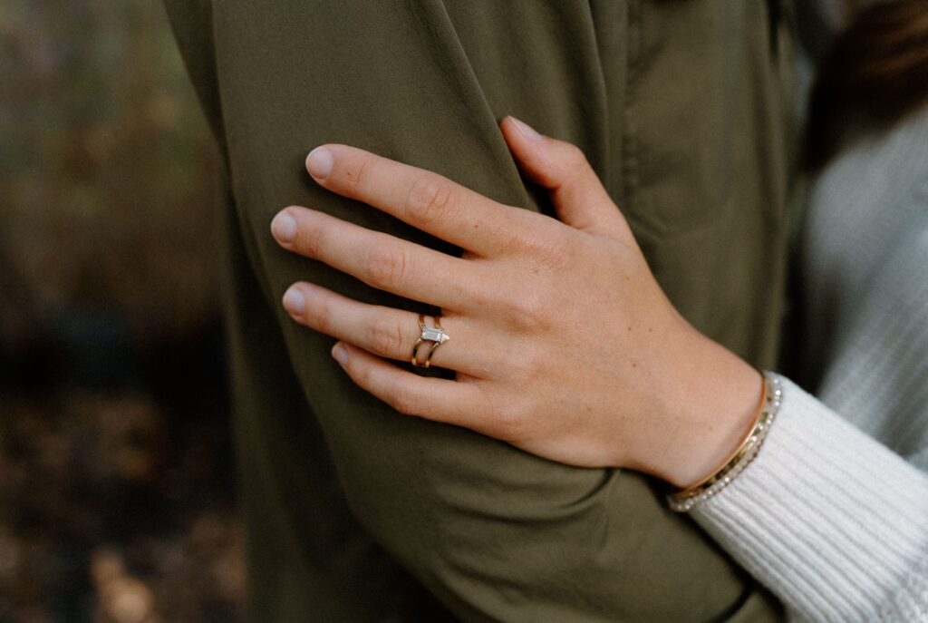 Fiancée showing engagement ring during session at Poudre Canyon