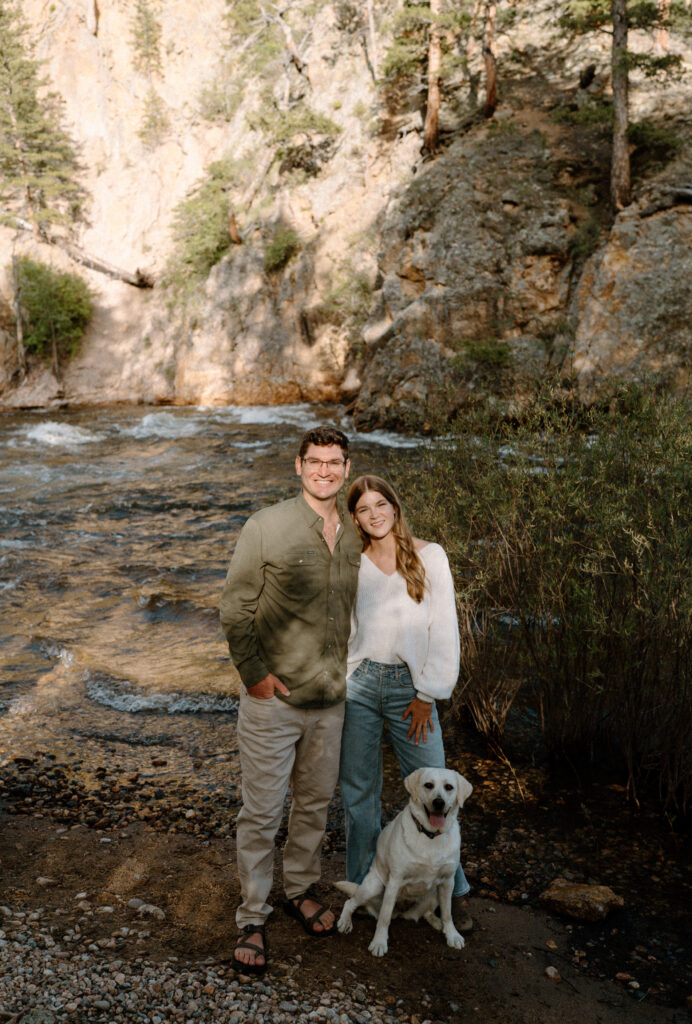 Couple smiling during engagement session at Poudre Canyon
