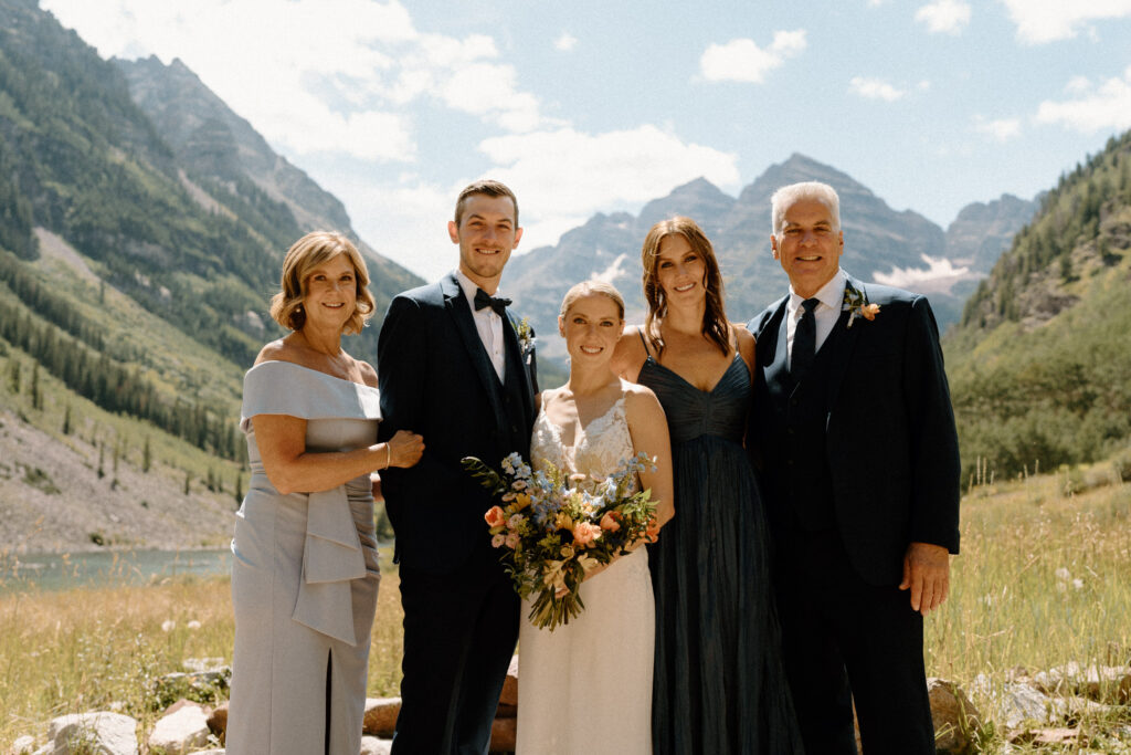Couple and their family during an elopement at Maroon Bells