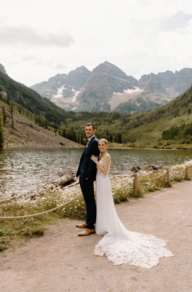 Bride and groom hugging and smiling during an elopement at Maroon Bells