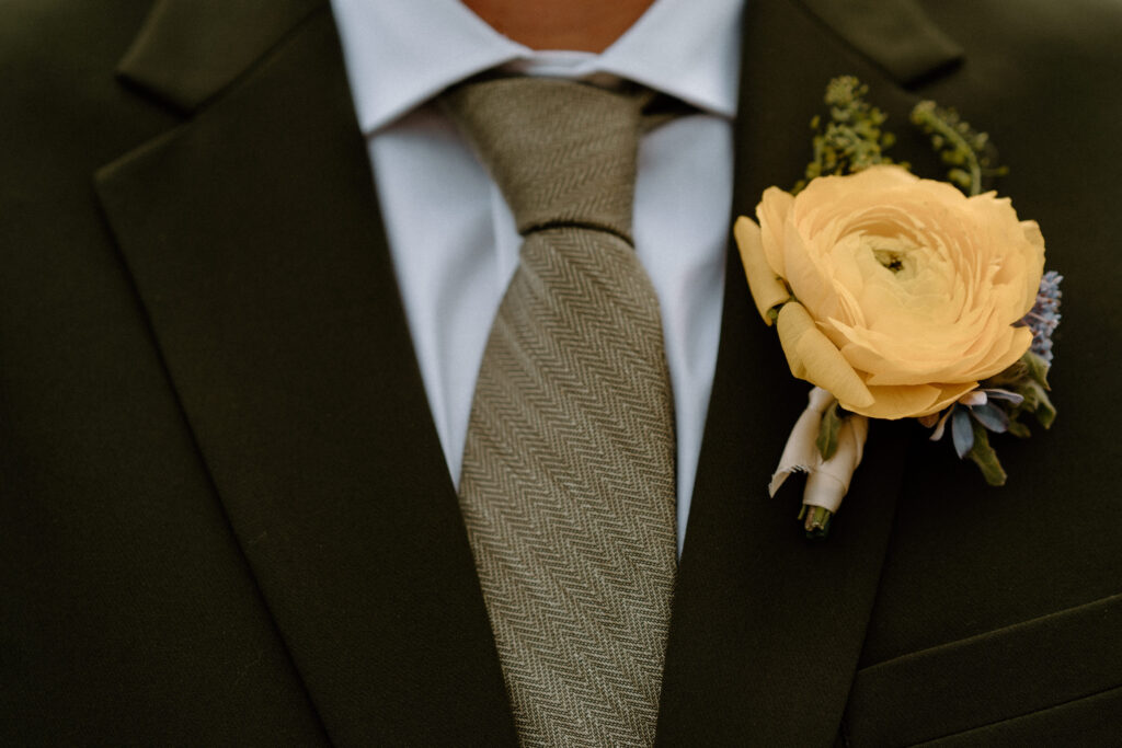 Groom's boutonniere on wedding day