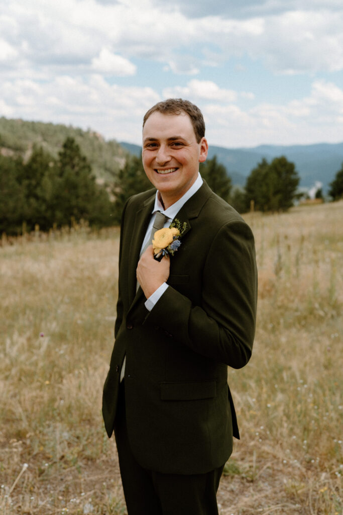 Groom smiling on wedding day at Mt. Falcon