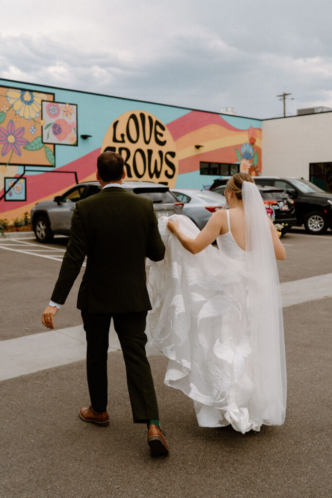 Bride and groom walking after wedding ceremony at Mountain Crust