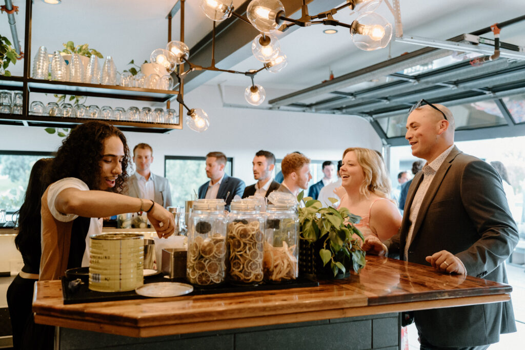 People waiting at the Mountain Crust bar on wedding day 