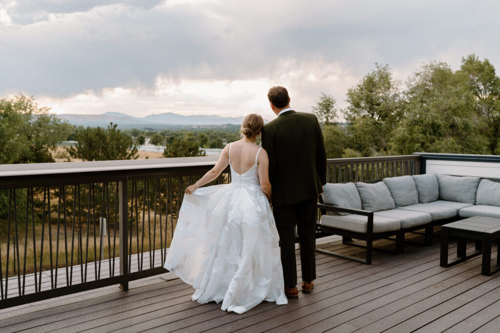 Bride and groom admiring the view of Mountain Crust on wedding day
