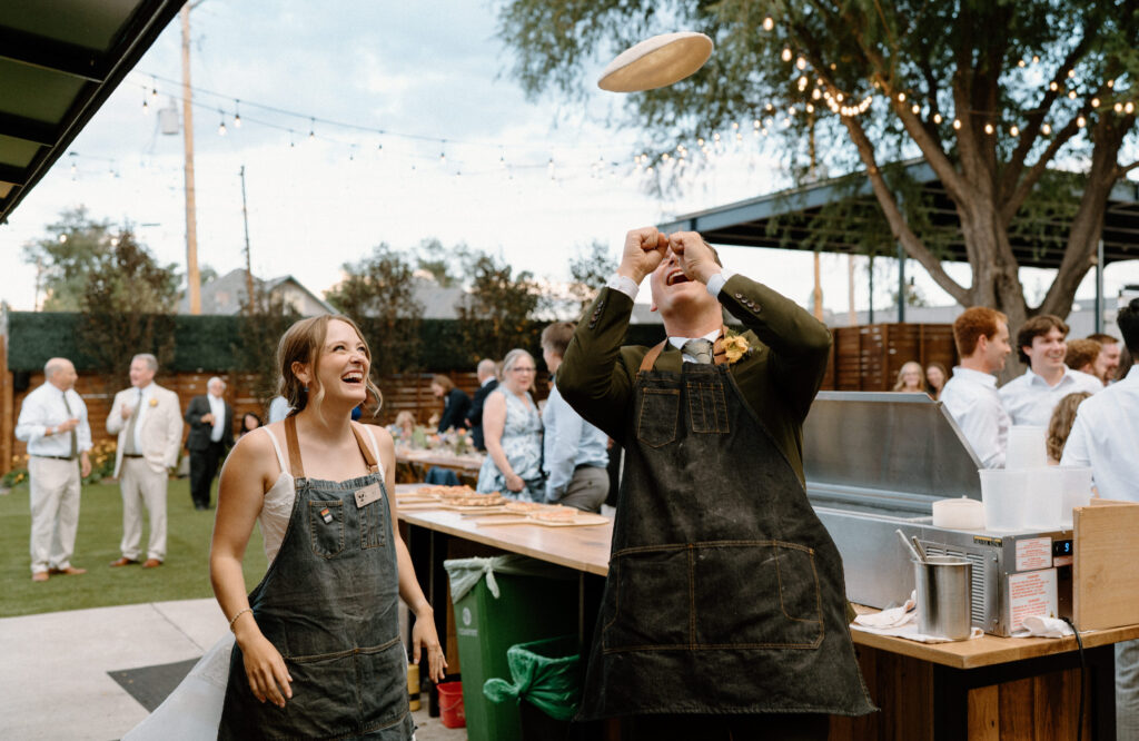 Groom tossing pizza dough on wedding day at Mountain Crust