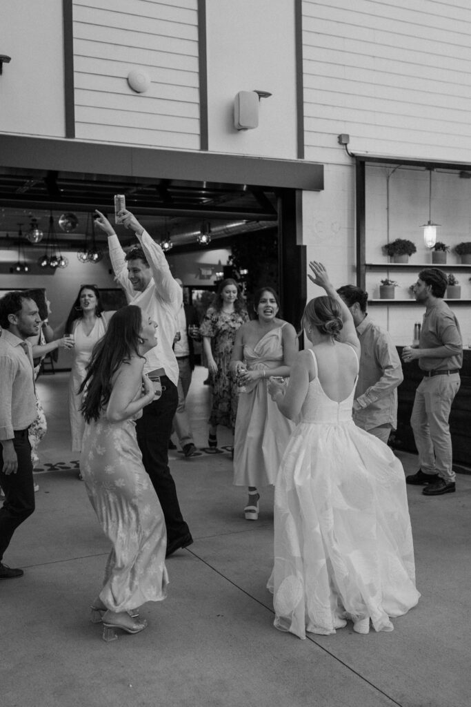 Wedding guests dancing on wedding day at Mountain Crust