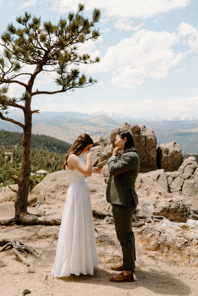 Bride crying during vows on wedding day at Sunrise Amphitheater 