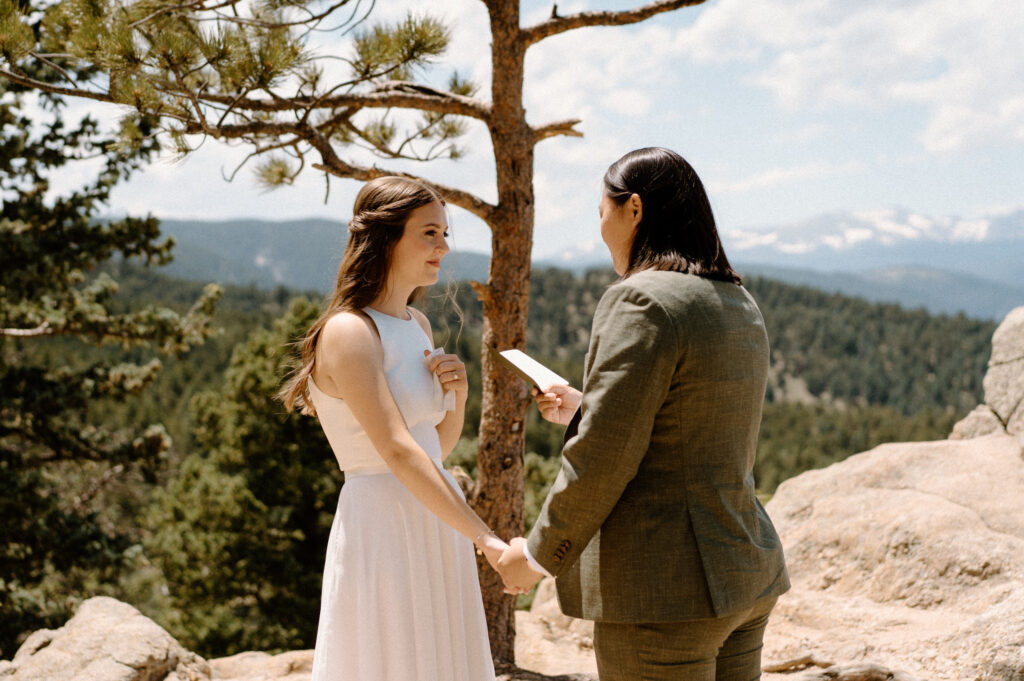 Bride saying vows on wedding day at Sunrise Amphitheater 