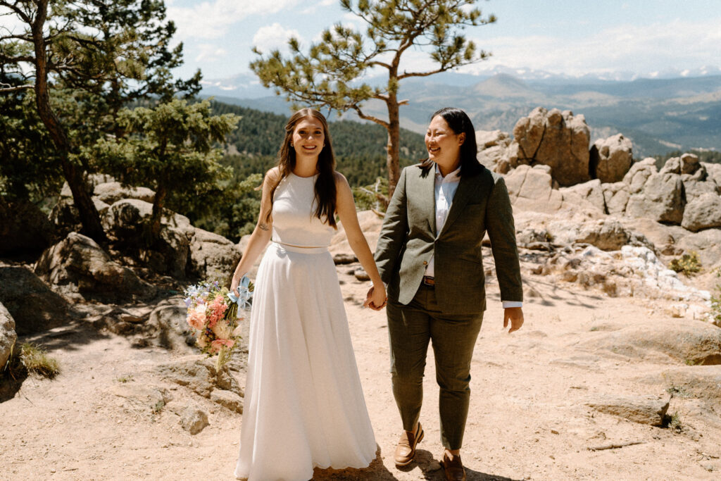 Couple walking on trail on wedding day 