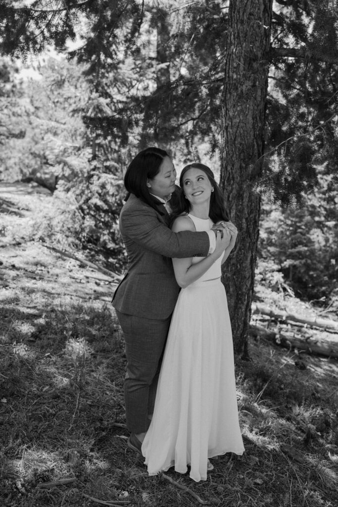 Couple smiling at each other on wedding day at Sunrise Amphitheater 