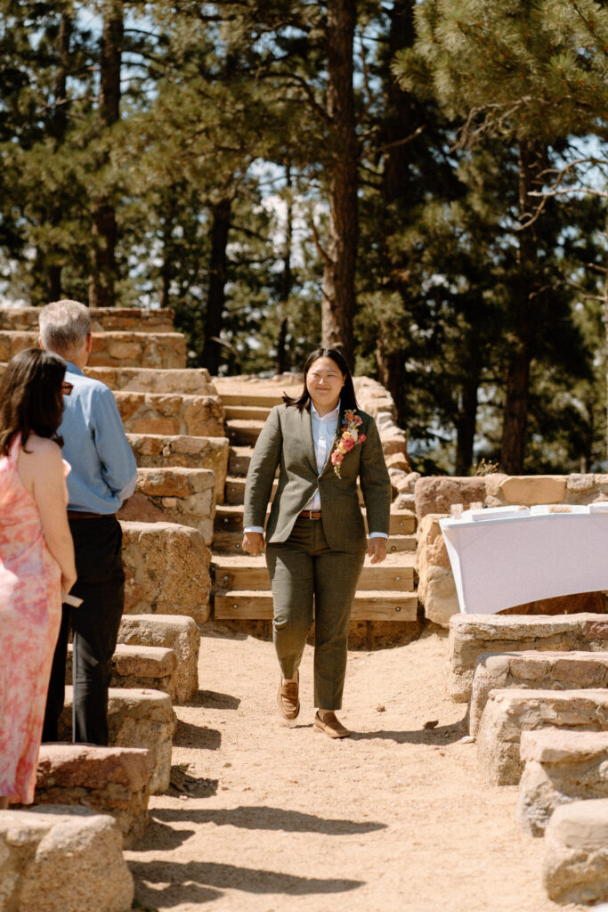 Bride walking down the aisle at Sunrise Amphitheater 