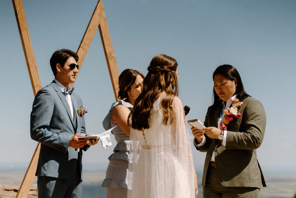 Bride saying vows on wedding day at Sunrise Amphitheater 