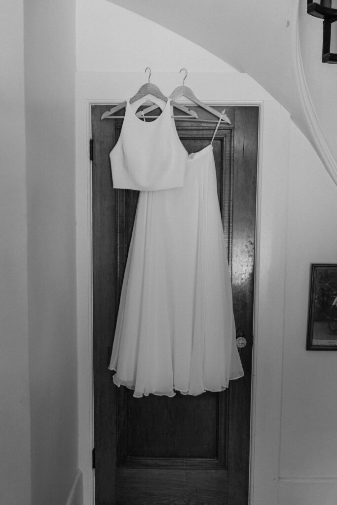 Wedding dress hanging on door from a wedding at Sunrise Amphitheater 