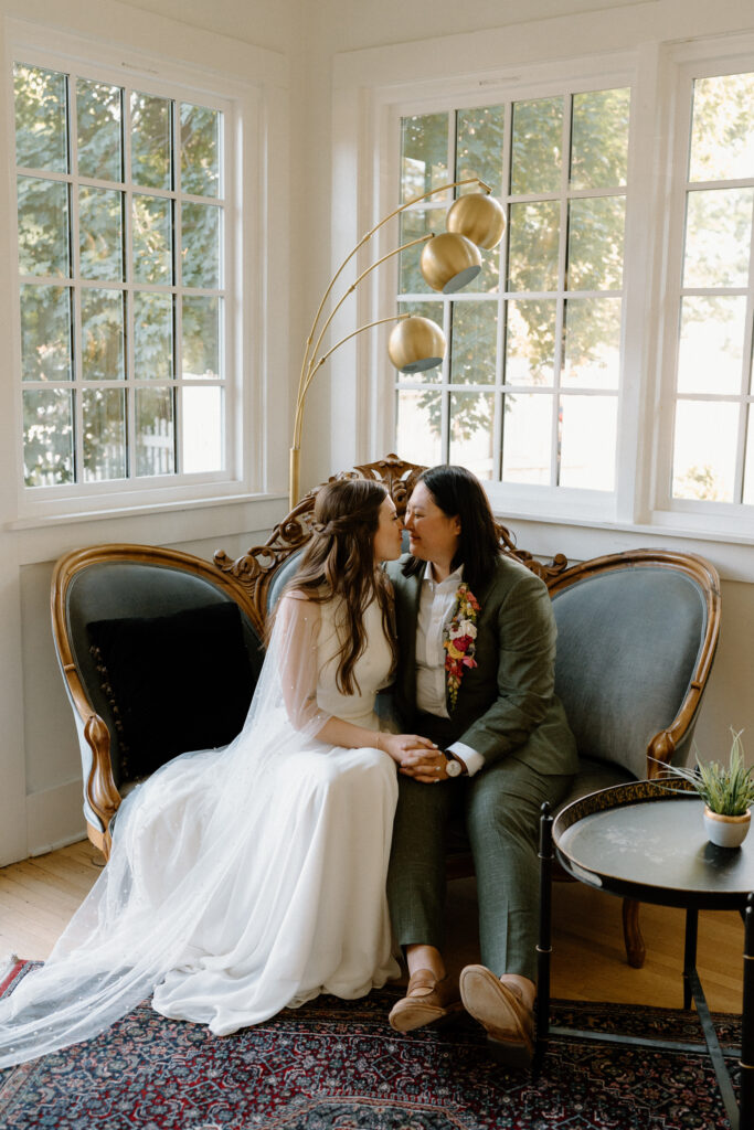 Couple smiling at each other during reception on wedding day