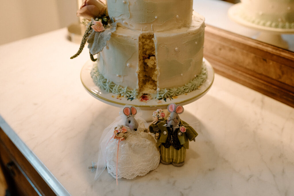 Wedding cake with a slice cut out from a wedding reception 
