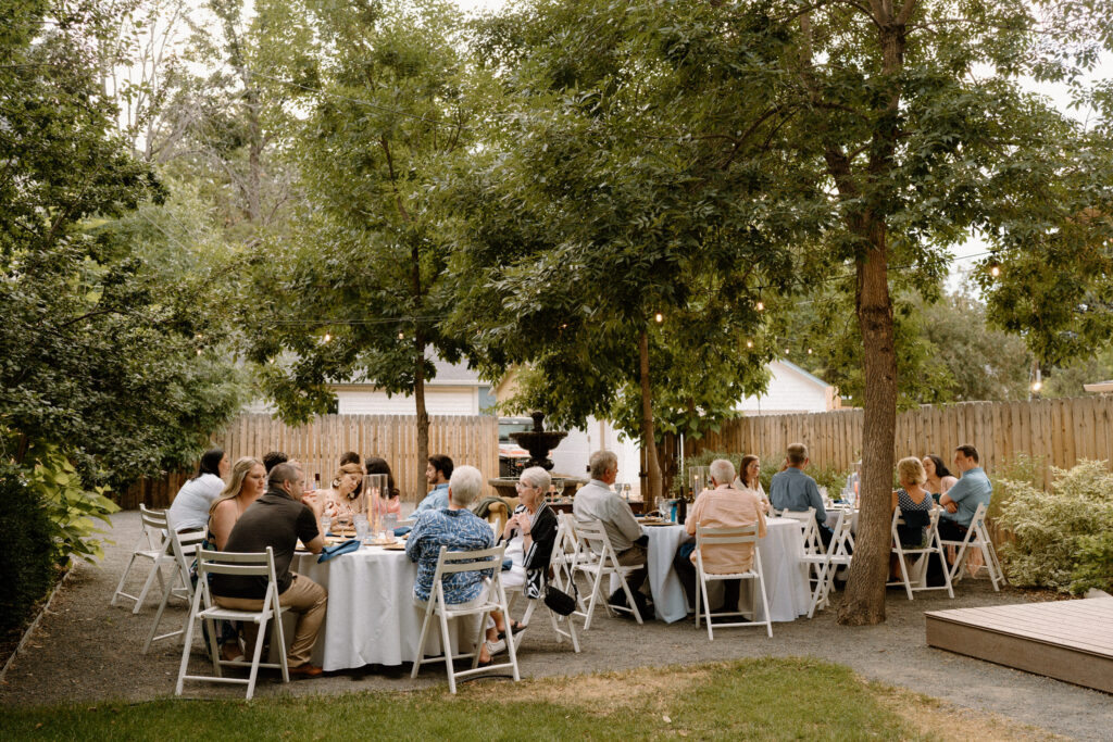Wedding guests eating dinner during reception