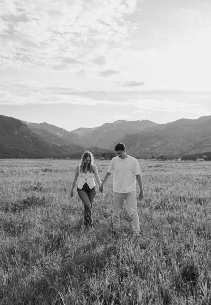 Couple hiking during an engagement session at Rocky Mountain National Park