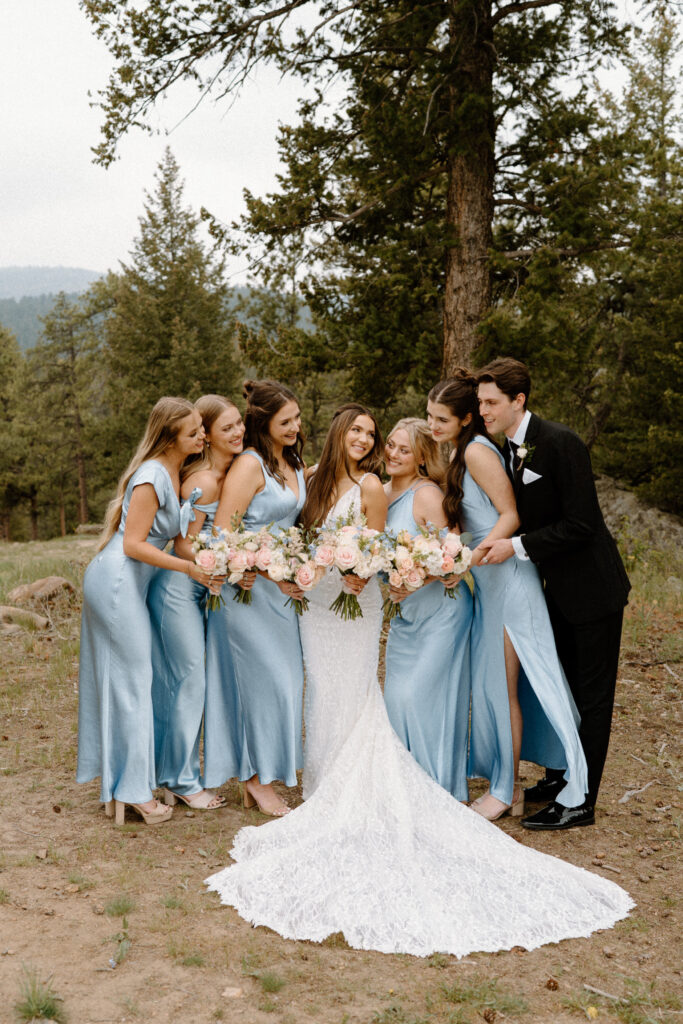 Bridal party smiling on wedding day at Woodlands