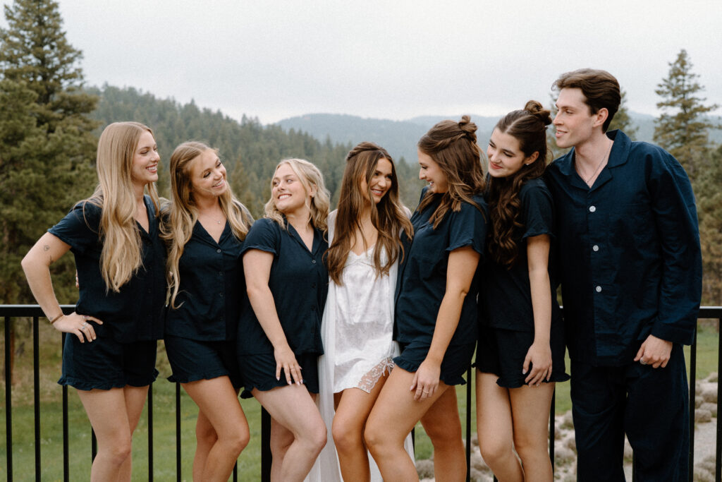 Bridal party laughing while getting ready at Woodlands