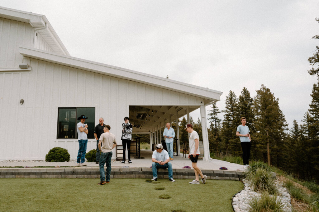 Groomsmen hanging out at Woodlands on wedding day