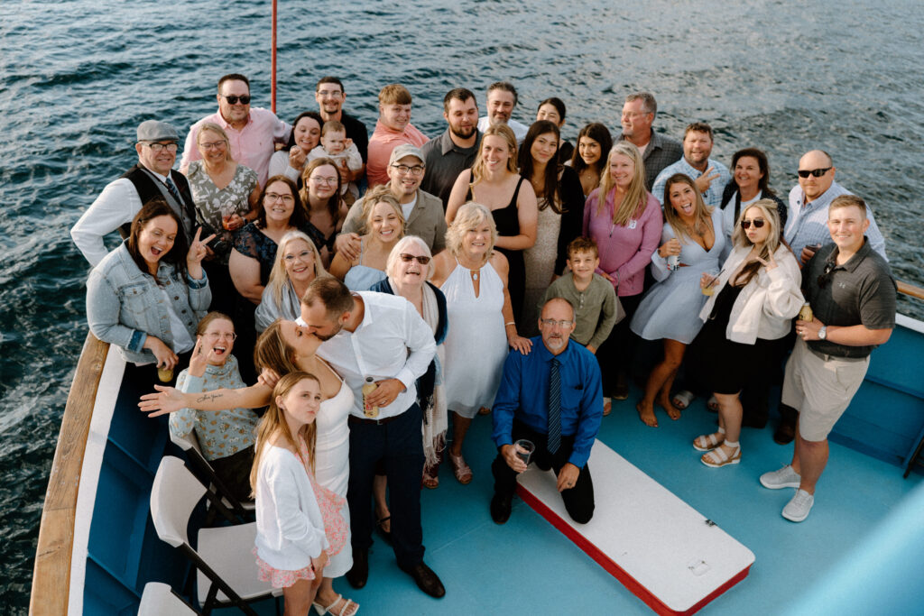 Wedding guests smiling during a rehearsal dinner in Montana
