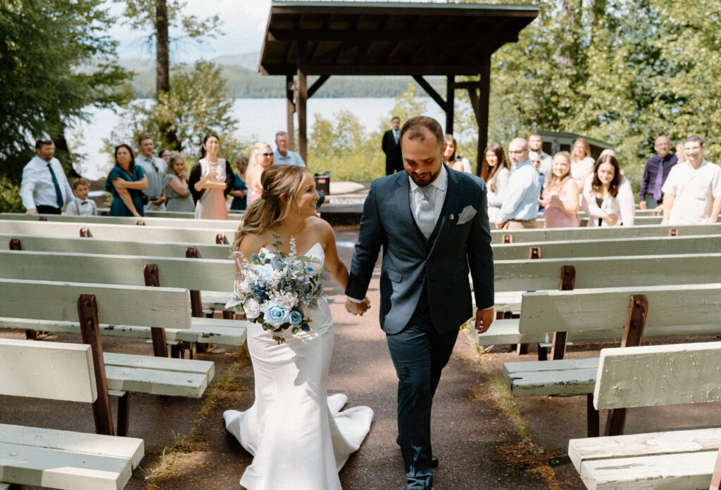 Bride and groom smiling after ceremony at an elopement at Glacier National Park