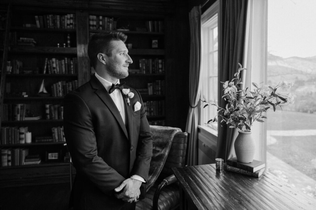 Groom smiling on wedding day at The Manor House