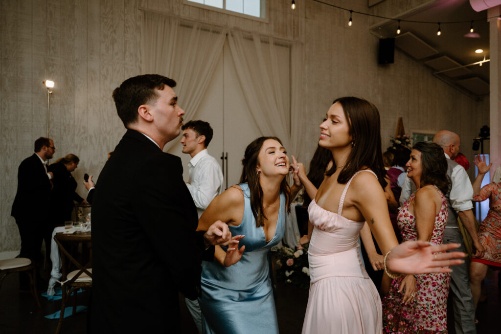 Wedding guests dancing at Woodlands on wedding day
