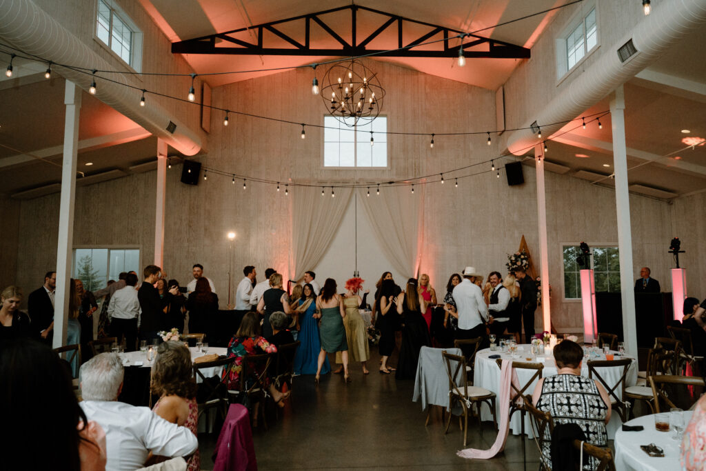 Wedding guests dancing at Woodlands on wedding day