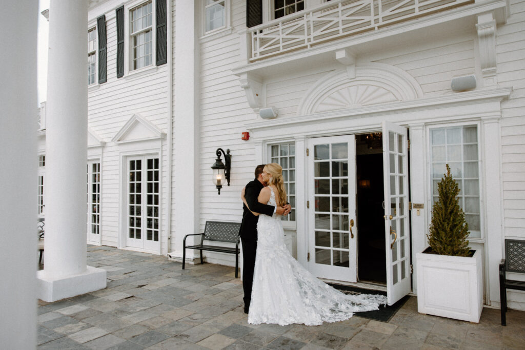 Bride and groom hugging during first look at The Manor House
